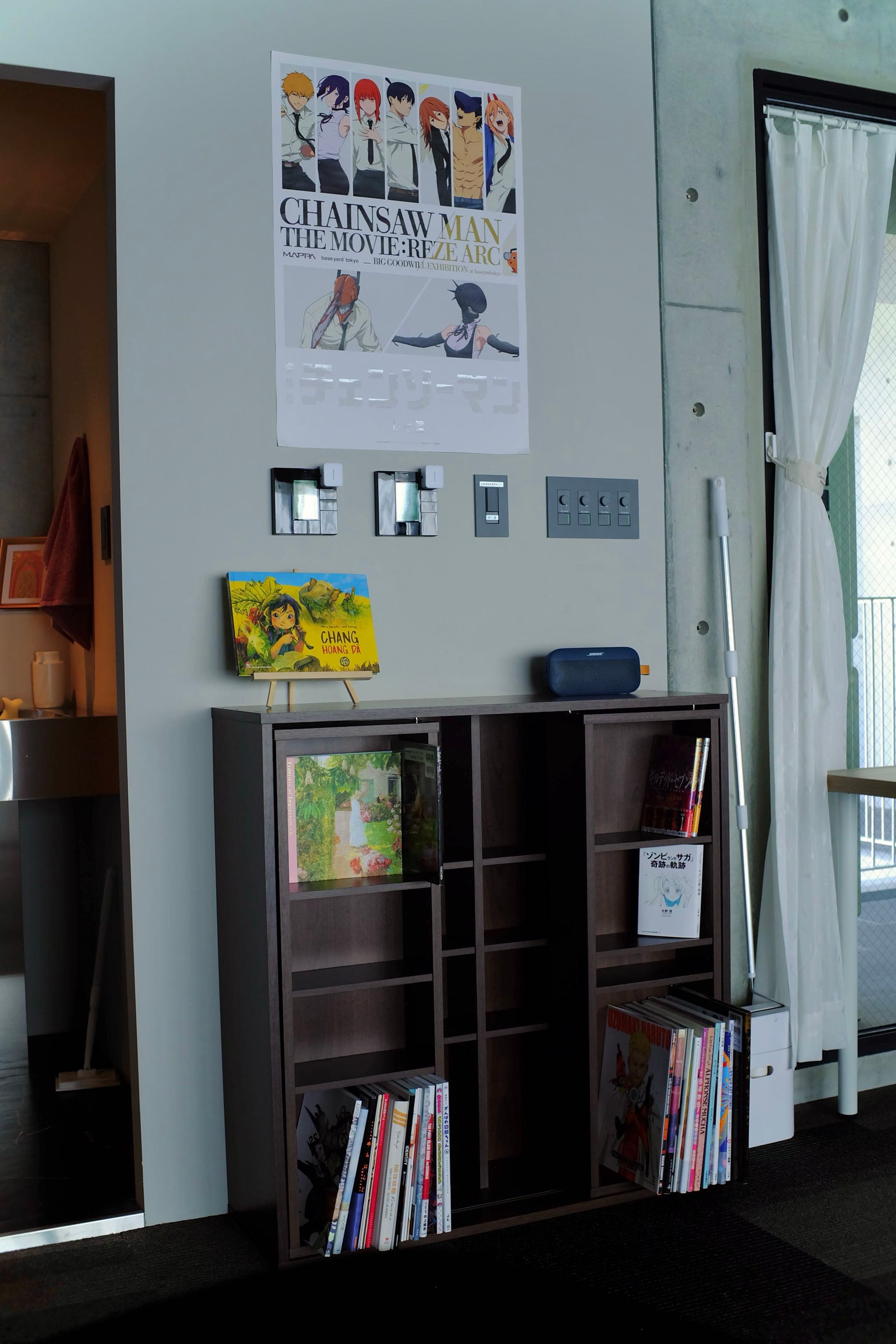 Studio bookshelf with manga and art books